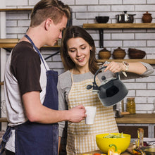 Load image into Gallery viewer, 2.5 Liter Whistling Tea Kettle - Modern Stainless Steel Whistling Tea Pot for Stovetop with Cool Grip Ergonomic Handle (Black)